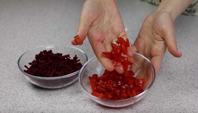 We clean and chop the beets, bell peppers and carrots.