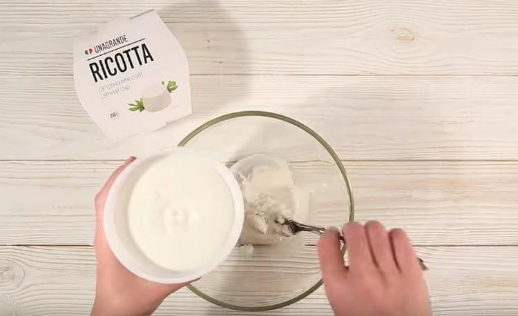 Put ricotta cheese in a bowl.