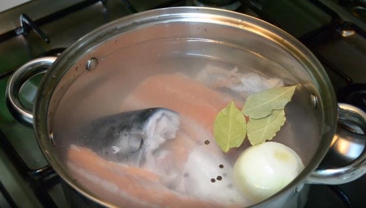 Immediately add salt, peas, bay leaf to the fish.