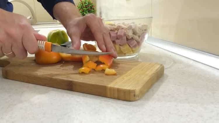 To prepare a salad with chicken pineapple and corn, chop bell pepper