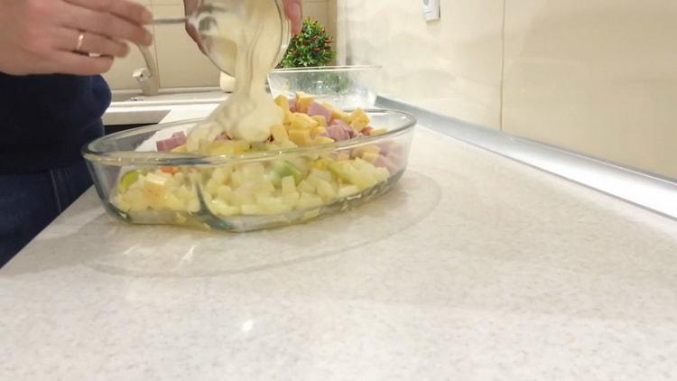 Add mayonnaise to make chicken and pineapple salad.