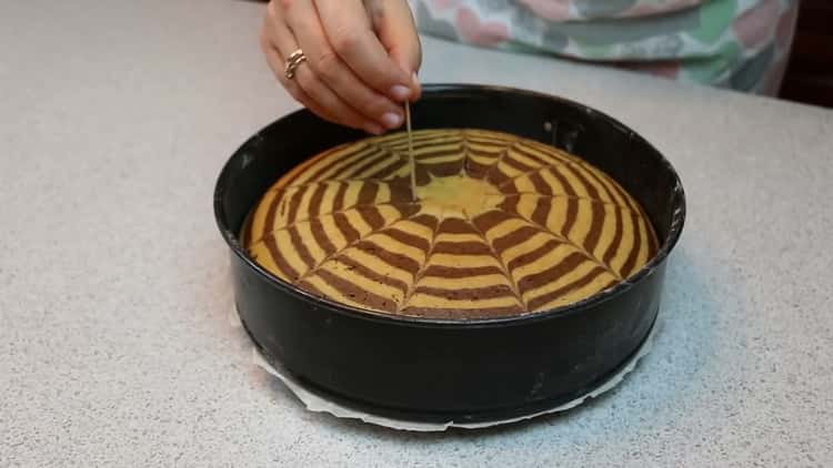 To make a zebra cake, check the readiness of the cake