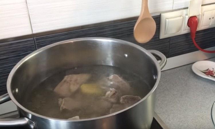 Put the potatoes into the broth, whole or cut in half.