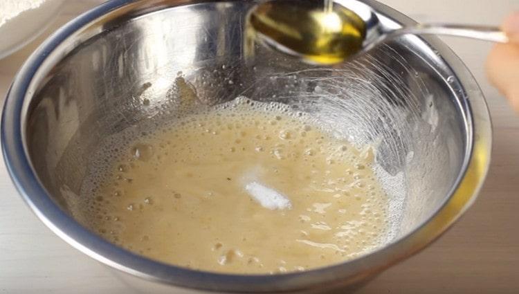 Add vegetable oil to the dough.