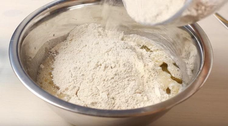 Add flour to the liquid components.