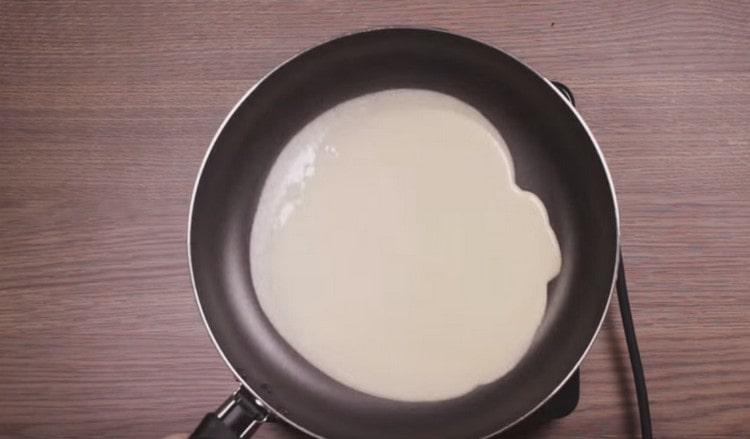 Pour the dough into a well-heated pan.