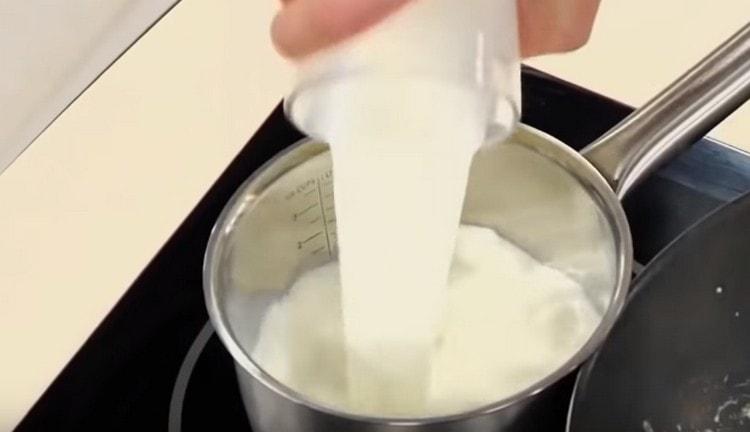Pour milk into a saucepan.