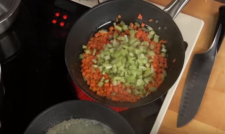 We cut the stem celery and send it to the pan to the carrot.