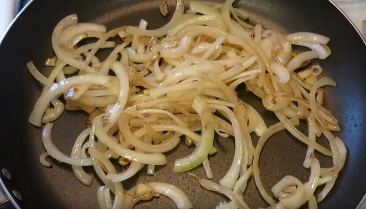 Fry the onion until golden brown.