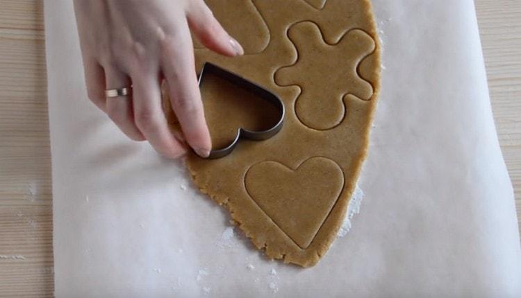 We roll the remaining dough into a ball, then roll it out again and make cookies.