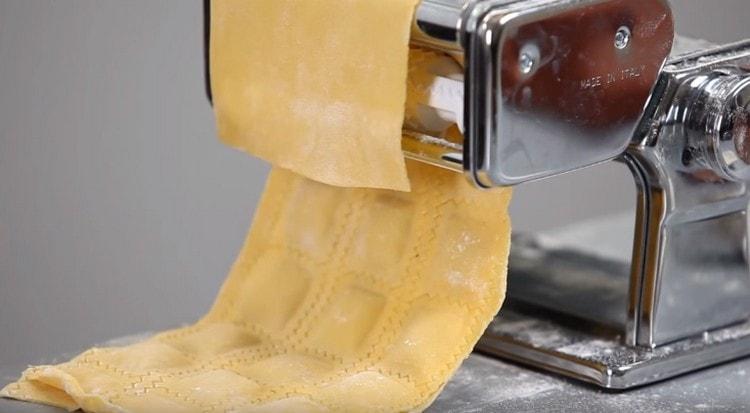 Ravioli is conveniently made using a special machine.