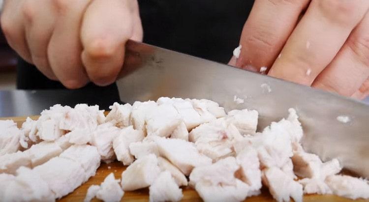 Cooled chicken cut into a cube.