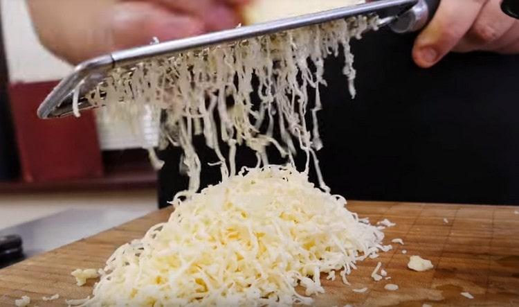 Rub the cheese on a fine grater.