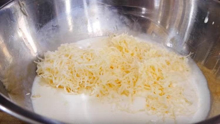 Grated cheese spread to fill.