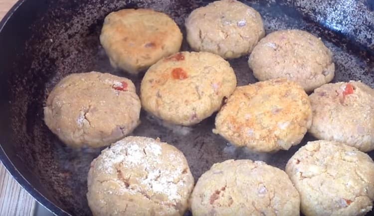 Fry the patties until golden brown.