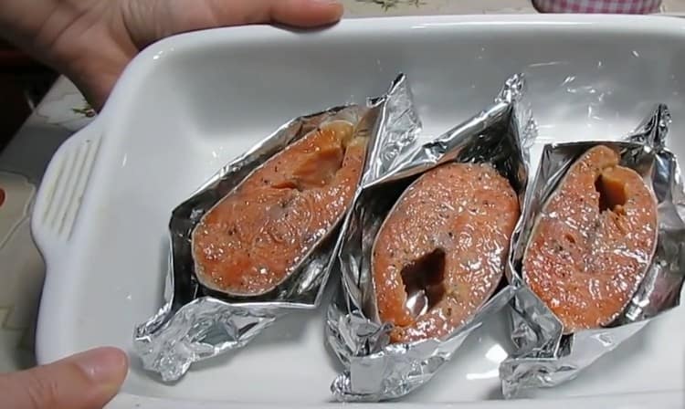 We spread the steaks in foil boats in a baking dish.