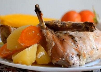 Baked rabbit in mayonnaise with potatoes in the oven