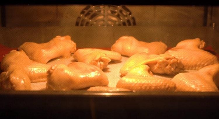 After marinating, blot the wings with napkins and send on the baking sheet to bake in the oven.