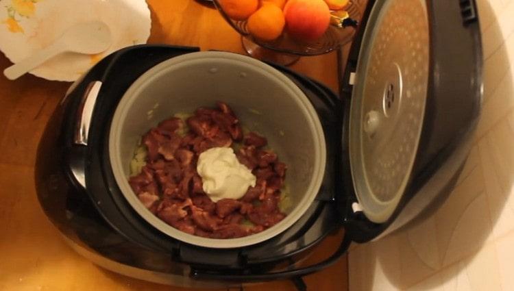Add sour cream to the slow cooker.