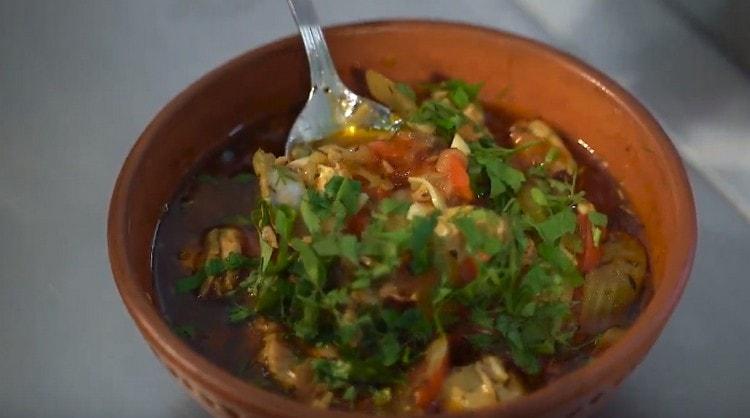 Lagman with chicken served in deep plates.