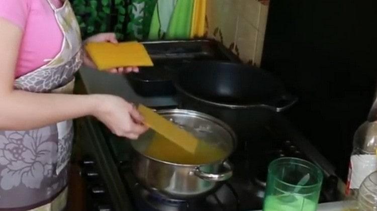 We put lasagna sheets in water.