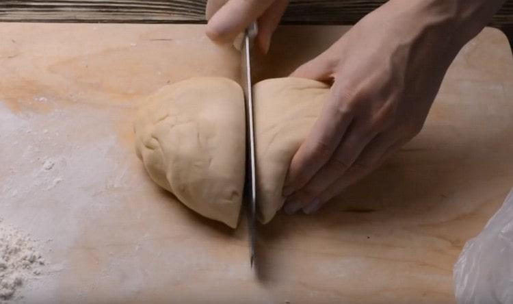 Cut the dough in half.