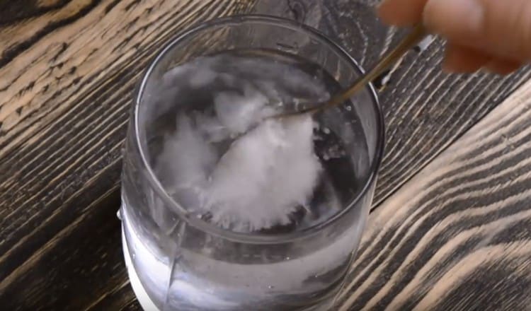 Dissolve salt in water.