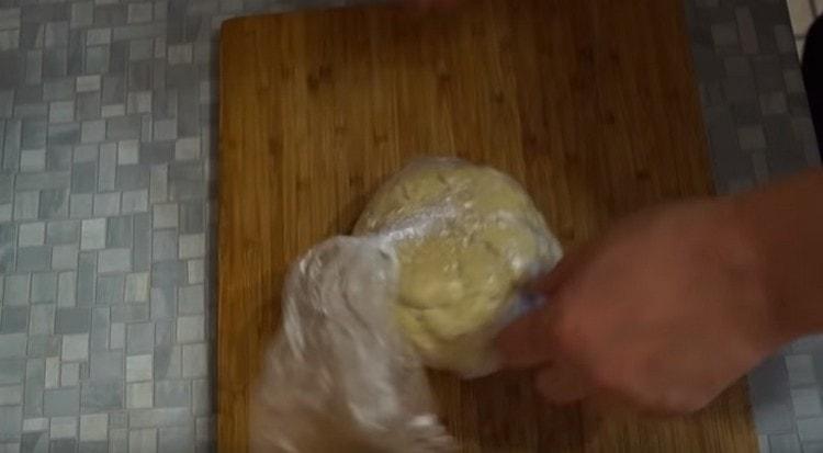 To keep the dough on, we transfer it to the package.