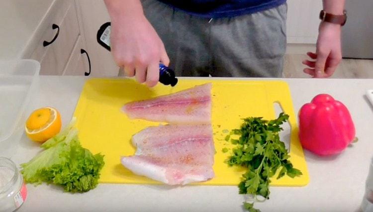 Lightly spray the fish with olive oil.