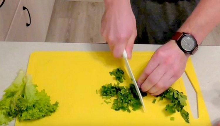 We wash lettuce leaves, chop parsley.