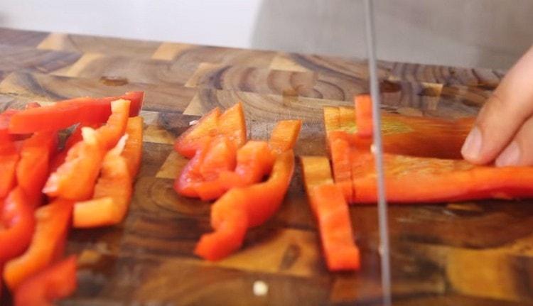 Bulgarian pepper cut into small sticks.