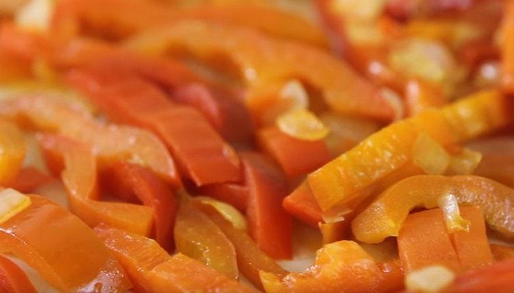 Fry vegetables until almost ready.