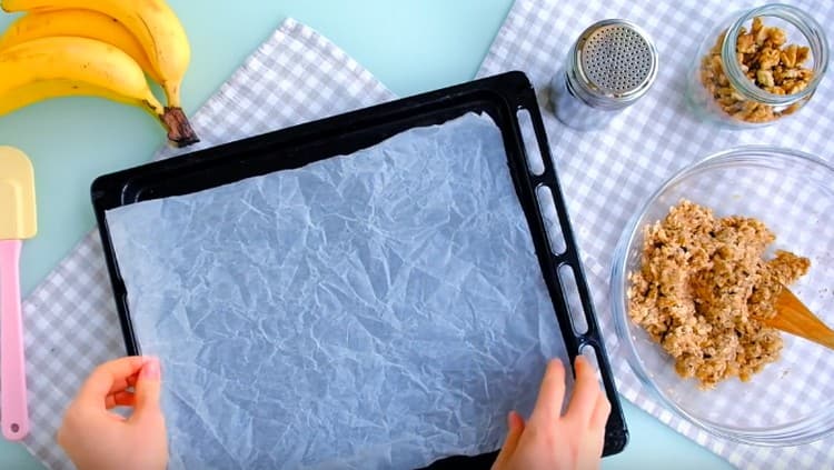 Cover the baking sheet with parchment.
