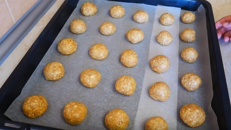 Dough balls must be laid on a baking sheet at a sufficiently large distance from each other.