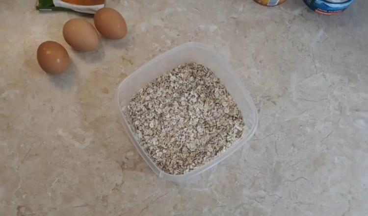 Pour oatmeal into a bowl.