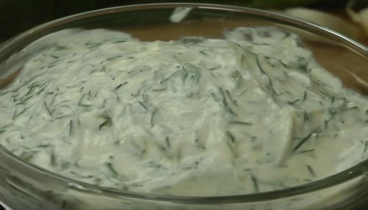 mix sour cream with garlic and herbs, and the sauce is ready.