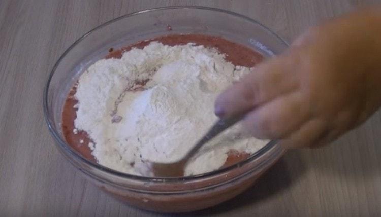 After mixing the mass, add the flour.