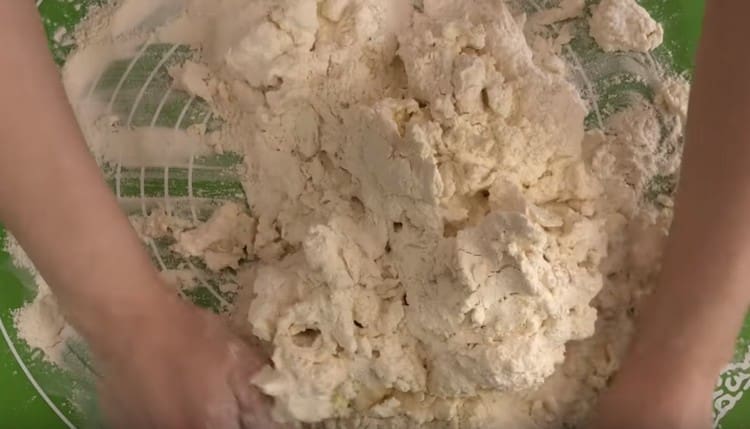 Grind cottage cheese with flour.