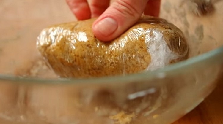 Knead the dough and wrap it in cling film.