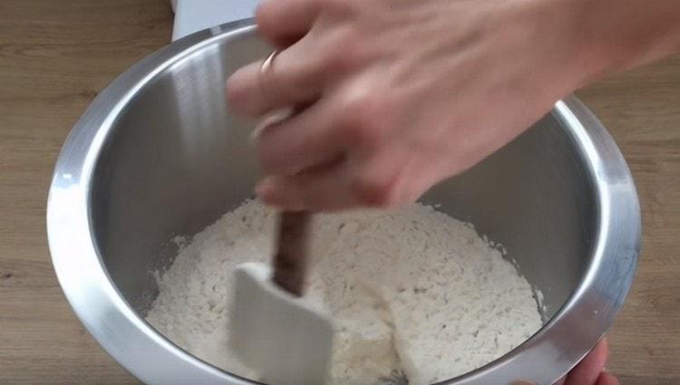 We combine flour with a baking powder.
