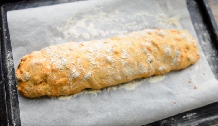 After an hour, we take our sausage of dough out of the oven and cool for 5 minutes.