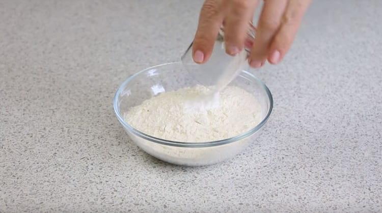 Combine flour with baking powder.