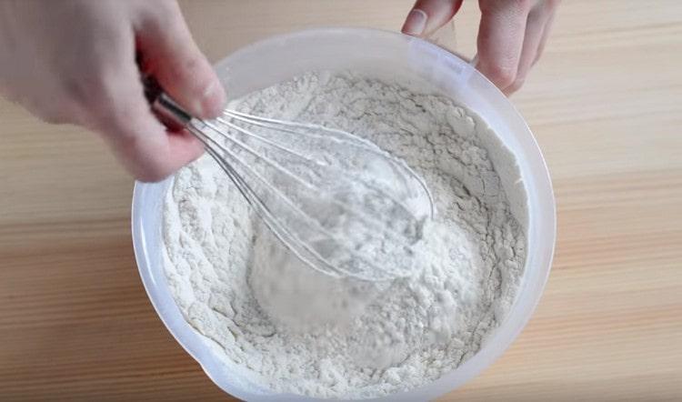 Add baking powder to flour and mix.