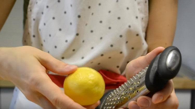 On a fine grater, directly rub the lemon peel into the dough.