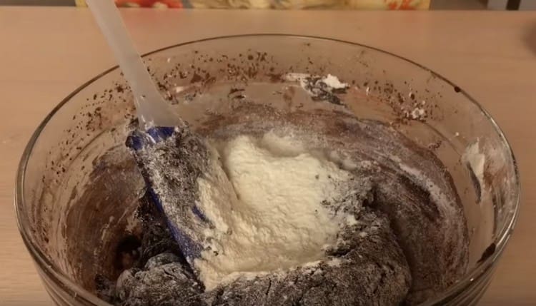 Mix the dough, and then add more flour.