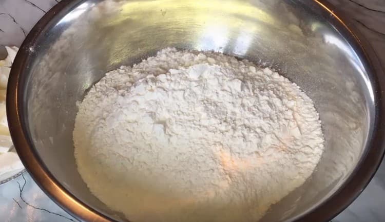 Sift flour into a bowl.