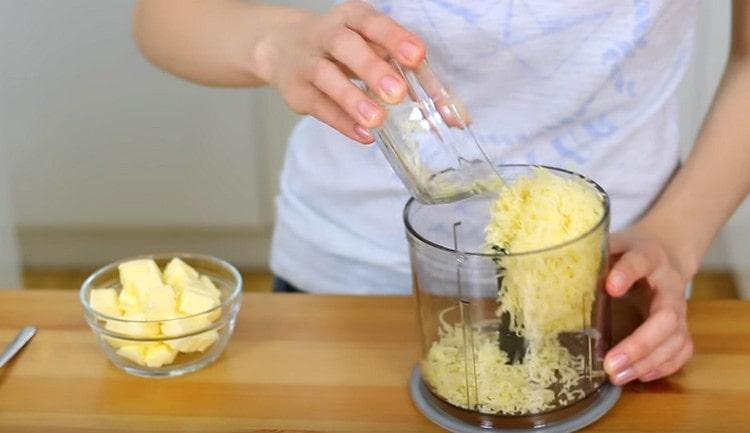Put the cheese in a blender bowl.