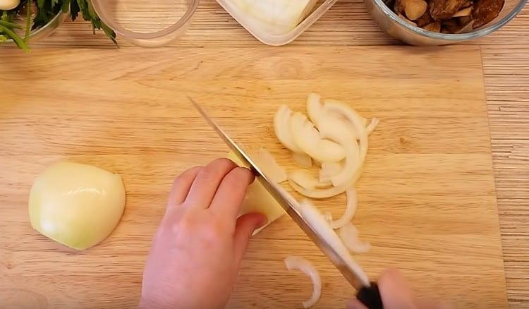 Chop the onion to make the filling.