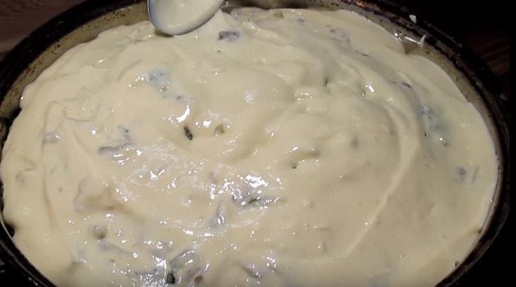 Cover the filling with the remaining dough.