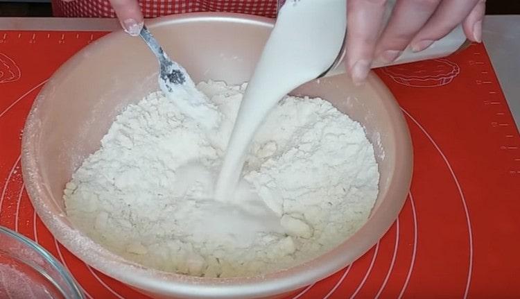 Add kefir to the dry ingredients.